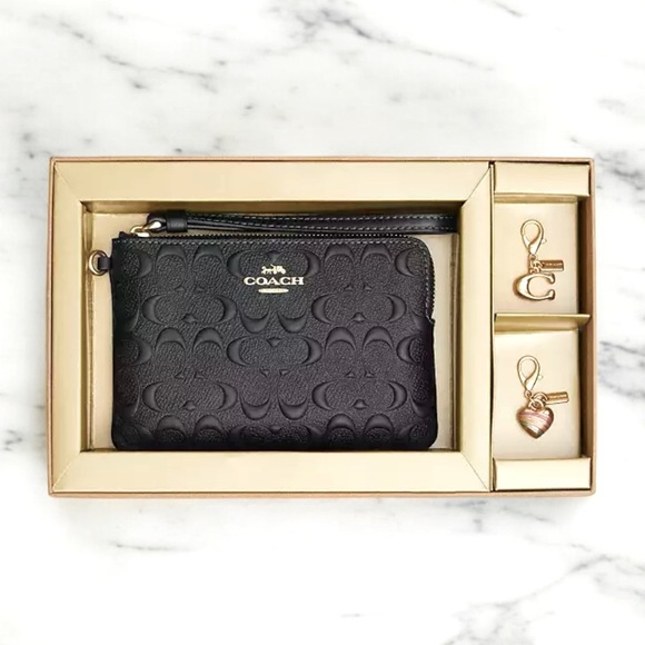 Coach Handbags - 💕NIB COACH Signature Leather Black Wristlet with two Gold Coach Charms💕